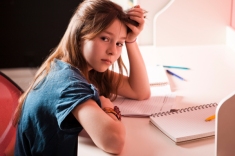 upset-girl-doing-homework
